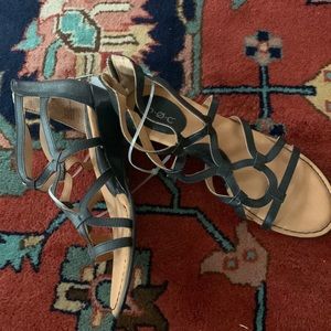 Boc black leather gladiator sandals. Size 7 zip back. Slight heels.